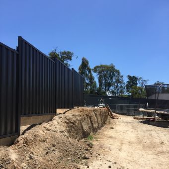 Colorbond-fence-built-on-a-hill_340x340_acf_cropped